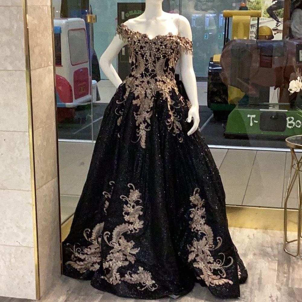 Elegant Black and Gold Off-Shoulder Evening Gown